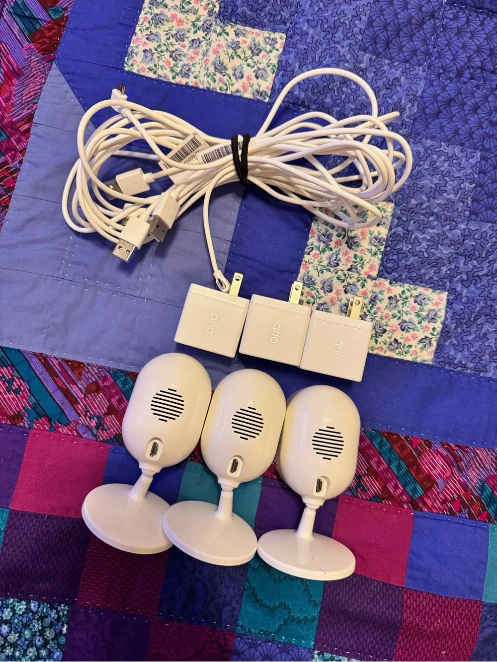 Arlo White Security Camera 3-Pack with Chargers Indoors